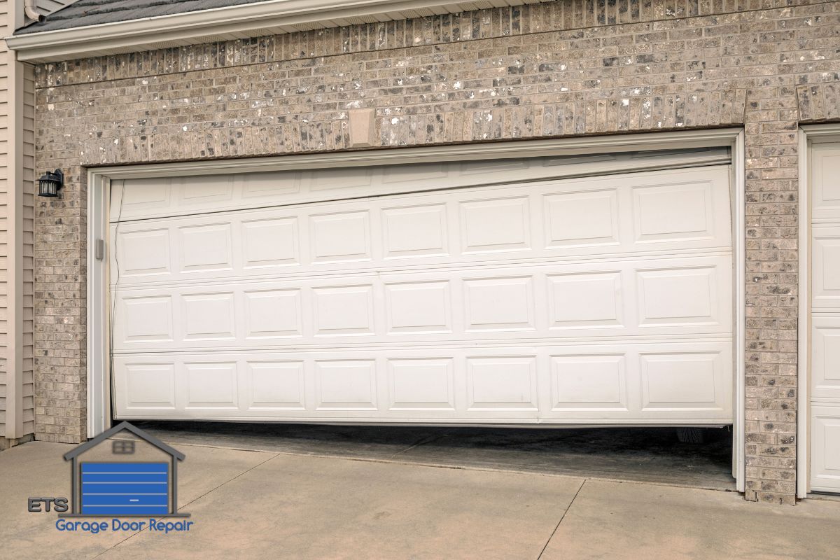 Is It Possible To Use Your Garage Door If The Tracks Are Bent